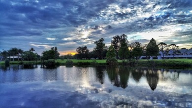 Under contract-accepting backup offers. This gorgeous tri-level on Seminole Lake Country Club in Florida - for sale on GolfHomes.com, golf home, golf lot