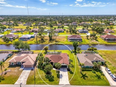 Waterfront Pool Home with Incredible Features in Rotonda West! on Rotonda Golf and Country Club - Long Marsh  in Florida - for sale on GolfHomes.com, golf home, golf lot