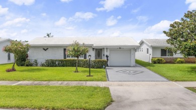 Delightful Challenger model nestled in the active 55+ community on Leisureville Community Golf Course in Florida - for sale on GolfHomes.com, golf home, golf lot