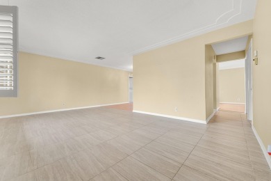Delightful Challenger model nestled in the active 55+ community on Leisureville Community Golf Course in Florida - for sale on GolfHomes.com, golf home, golf lot