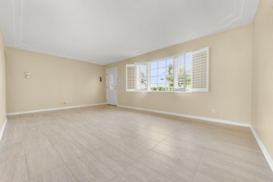 Delightful Challenger model nestled in the active 55+ community on Leisureville Community Golf Course in Florida - for sale on GolfHomes.com, golf home, golf lot