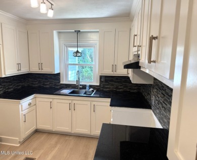 NICE & NEAT IS THIS 3 BEDROOM, 2 BATH HOME THAT HAS BEEN UPDATED on Duncan Park Golf Course in Mississippi - for sale on GolfHomes.com, golf home, golf lot