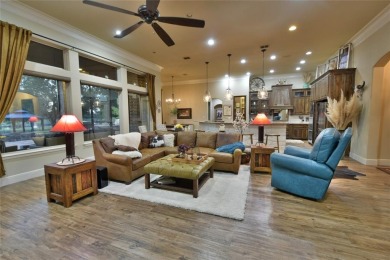 Luxury living on the golf course! Nestled along the 14th hole of on Pecan Plantation Country Club in Texas - for sale on GolfHomes.com, golf home, golf lot