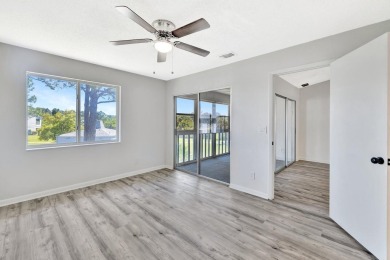 Poolside Views in Golf Lake Villas! This 2-bedroom, 2-bathroom on Island Pines Golf Club in Florida - for sale on GolfHomes.com, golf home, golf lot