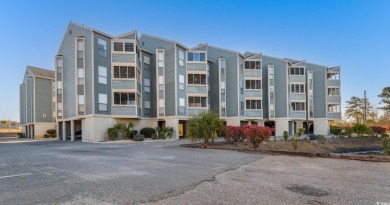 Discover coastal living at its finest in this 2-bedroom on Beachwood Golf Club in South Carolina - for sale on GolfHomes.com, golf home, golf lot