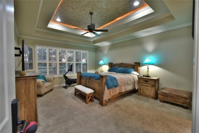 Luxury living on the golf course! Nestled along the 14th hole of on Pecan Plantation Country Club in Texas - for sale on GolfHomes.com, golf home, golf lot