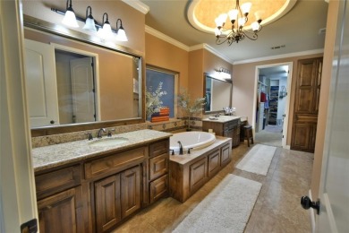 Luxury living on the golf course! Nestled along the 14th hole of on Pecan Plantation Country Club in Texas - for sale on GolfHomes.com, golf home, golf lot