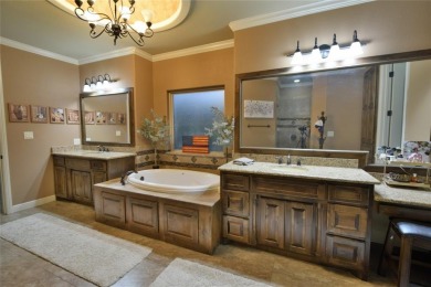 Luxury living on the golf course! Nestled along the 14th hole of on Pecan Plantation Country Club in Texas - for sale on GolfHomes.com, golf home, golf lot