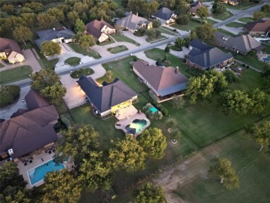 Luxury living on the golf course! Nestled along the 14th hole of on Pecan Plantation Country Club in Texas - for sale on GolfHomes.com, golf home, golf lot