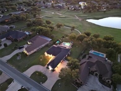 Luxury living on the golf course! Nestled along the 14th hole of on Pecan Plantation Country Club in Texas - for sale on GolfHomes.com, golf home, golf lot