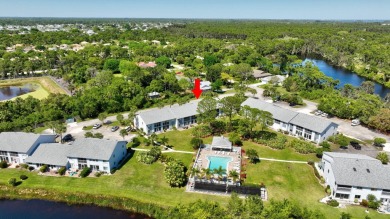 Poolside Views in Golf Lake Villas! This 2-bedroom, 2-bathroom on Island Pines Golf Club in Florida - for sale on GolfHomes.com, golf home, golf lot