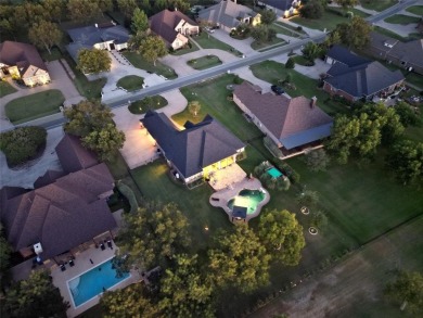 Luxury living on the golf course! Nestled along the 14th hole of on Pecan Plantation Country Club in Texas - for sale on GolfHomes.com, golf home, golf lot