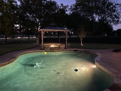 Luxury living on the golf course! Nestled along the 14th hole of on Pecan Plantation Country Club in Texas - for sale on GolfHomes.com, golf home, golf lot