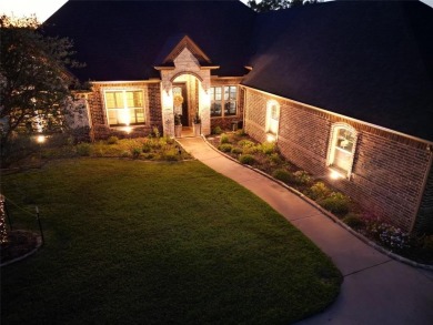 Luxury living on the golf course! Nestled along the 14th hole of on Pecan Plantation Country Club in Texas - for sale on GolfHomes.com, golf home, golf lot