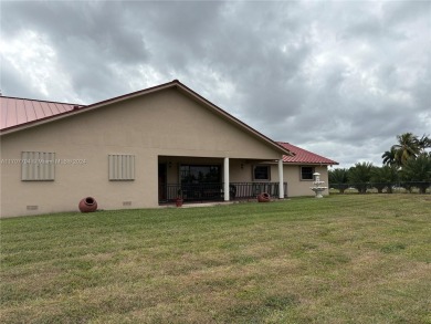 Beautiful 3/2 on 5 Acres with lots of Fruit trees . Back of on Redland Golf and Country Club in Florida - for sale on GolfHomes.com, golf home, golf lot