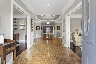 Welcome to this exceptional 4-bedroom, 5-bath custom waterfront on Sunkist Country Club, Inc. in Mississippi - for sale on GolfHomes.com, golf home, golf lot