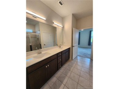 This like-new 3/2/2 home in Jensen Beach offers a perfect blend on Eagle Marsh Golf Club in Florida - for sale on GolfHomes.com, golf home, golf lot