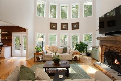 Price to move, this custom-built home sits on a roundabout on Hampton Golf Village in Georgia - for sale on GolfHomes.com, golf home, golf lot