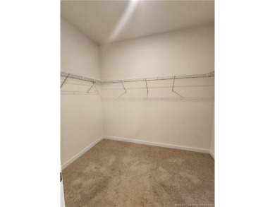 This like-new 3/2/2 home in Jensen Beach offers a perfect blend on Eagle Marsh Golf Club in Florida - for sale on GolfHomes.com, golf home, golf lot