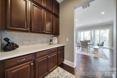 Luxury home with a finished walkout basement in the gated on The Palisades Country Club in North Carolina - for sale on GolfHomes.com, golf home, golf lot