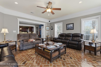 Welcome to this exceptional 4-bedroom, 5-bath custom waterfront on Sunkist Country Club, Inc. in Mississippi - for sale on GolfHomes.com, golf home, golf lot