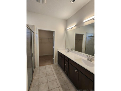This like-new 3/2/2 home in Jensen Beach offers a perfect blend on Eagle Marsh Golf Club in Florida - for sale on GolfHomes.com, golf home, golf lot