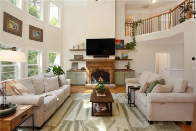 Price to move, this custom-built home sits on a roundabout on Hampton Golf Village in Georgia - for sale on GolfHomes.com, golf home, golf lot