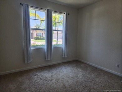 This like-new 3/2/2 home in Jensen Beach offers a perfect blend on Eagle Marsh Golf Club in Florida - for sale on GolfHomes.com, golf home, golf lot