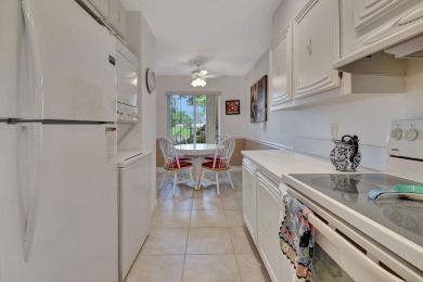 Meticulously maintained, spacious, first floor corner condo with on Villa Del Ray Golf Club in Florida - for sale on GolfHomes.com, golf home, golf lot