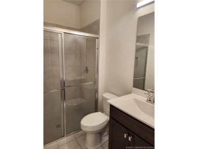 This like-new 3/2/2 home in Jensen Beach offers a perfect blend on Eagle Marsh Golf Club in Florida - for sale on GolfHomes.com, golf home, golf lot