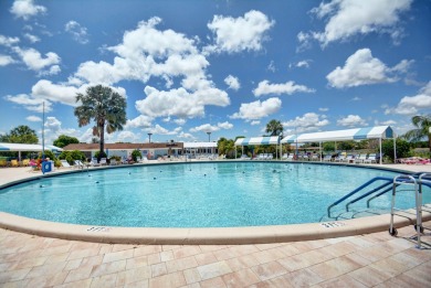 Meticulously maintained, spacious, first floor corner condo with on Villa Del Ray Golf Club in Florida - for sale on GolfHomes.com, golf home, golf lot