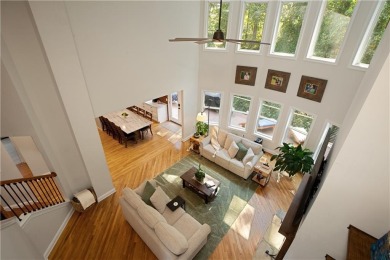 Price to move, this custom-built home sits on a roundabout on Hampton Golf Village in Georgia - for sale on GolfHomes.com, golf home, golf lot