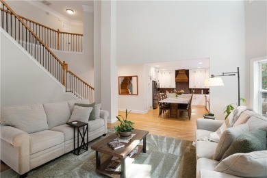 Price to move, this custom-built home sits on a roundabout on Hampton Golf Village in Georgia - for sale on GolfHomes.com, golf home, golf lot