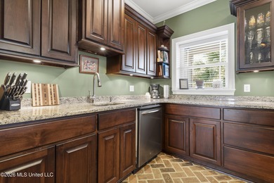 Welcome to this exceptional 4-bedroom, 5-bath custom waterfront on Sunkist Country Club, Inc. in Mississippi - for sale on GolfHomes.com, golf home, golf lot