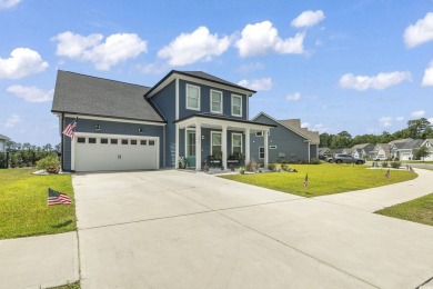 This immaculate 2 story 5 bedroom 3 full bathroom home was on International Club of Myrtle Beach in South Carolina - for sale on GolfHomes.com, golf home, golf lot