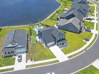 This immaculate 2 story 5 bedroom 3 full bathroom home was on International Club of Myrtle Beach in South Carolina - for sale on GolfHomes.com, golf home, golf lot