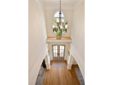 Price to move, this custom-built home sits on a roundabout on Hampton Golf Village in Georgia - for sale on GolfHomes.com, golf home, golf lot