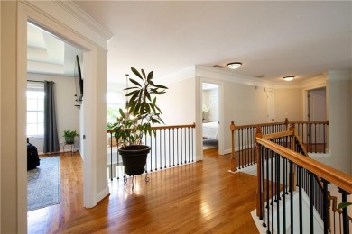 Price to move, this custom-built home sits on a roundabout on Hampton Golf Village in Georgia - for sale on GolfHomes.com, golf home, golf lot