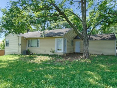 Price reduced!! Great potential in the true ranch that backs up on Leavenworth Country Club in Kansas - for sale on GolfHomes.com, golf home, golf lot