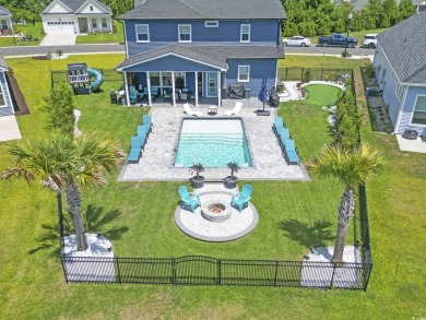 This immaculate 2 story 5 bedroom 3 full bathroom home was on International Club of Myrtle Beach in South Carolina - for sale on GolfHomes.com, golf home, golf lot