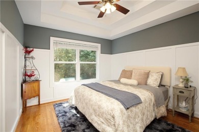 Price to move, this custom-built home sits on a roundabout on Hampton Golf Village in Georgia - for sale on GolfHomes.com, golf home, golf lot