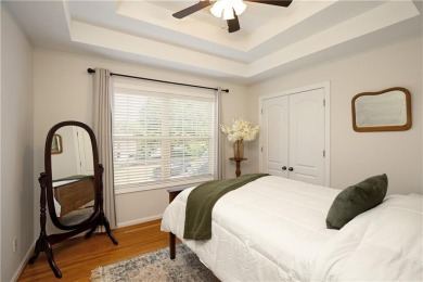 Price to move, this custom-built home sits on a roundabout on Hampton Golf Village in Georgia - for sale on GolfHomes.com, golf home, golf lot