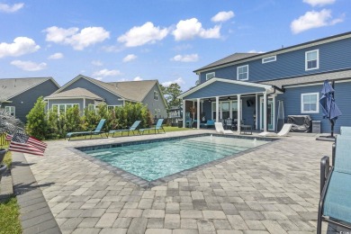 This immaculate 2 story 5 bedroom 3 full bathroom home was on International Club of Myrtle Beach in South Carolina - for sale on GolfHomes.com, golf home, golf lot