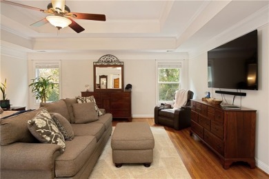 Price to move, this custom-built home sits on a roundabout on Hampton Golf Village in Georgia - for sale on GolfHomes.com, golf home, golf lot