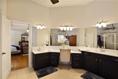 Price to move, this custom-built home sits on a roundabout on Hampton Golf Village in Georgia - for sale on GolfHomes.com, golf home, golf lot