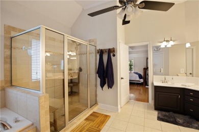 Price to move, this custom-built home sits on a roundabout on Hampton Golf Village in Georgia - for sale on GolfHomes.com, golf home, golf lot
