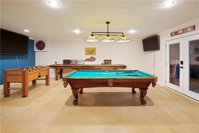 Price to move, this custom-built home sits on a roundabout on Hampton Golf Village in Georgia - for sale on GolfHomes.com, golf home, golf lot