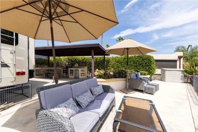 Gorgeous water and golf course views highlight this exceptional on  in California - for sale on GolfHomes.com, golf home, golf lot