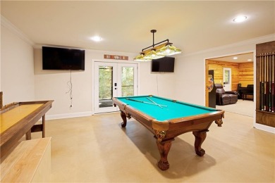 Price to move, this custom-built home sits on a roundabout on Hampton Golf Village in Georgia - for sale on GolfHomes.com, golf home, golf lot