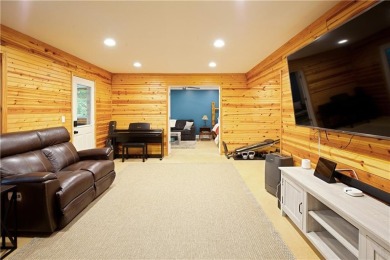Price to move, this custom-built home sits on a roundabout on Hampton Golf Village in Georgia - for sale on GolfHomes.com, golf home, golf lot